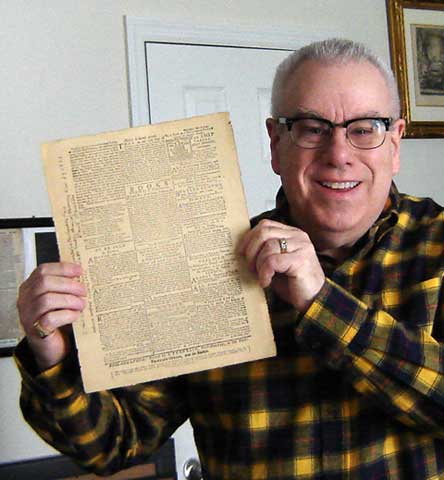 The author, Frank DeFreitas, with the Benjamin Franklin printing press sheet, showing the advertisement for Franklin's Philadelphia Market Street Book Shop, and his selection of Bibles and other Christian publications.